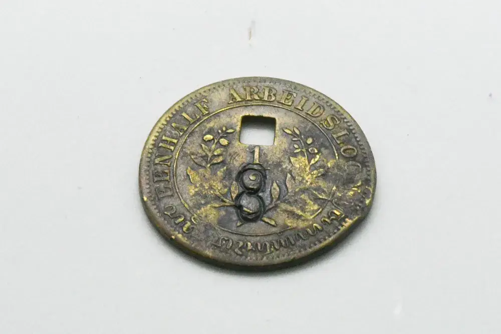 A brass plantation token from Onderneming Argasari, Bandoeng, 1892